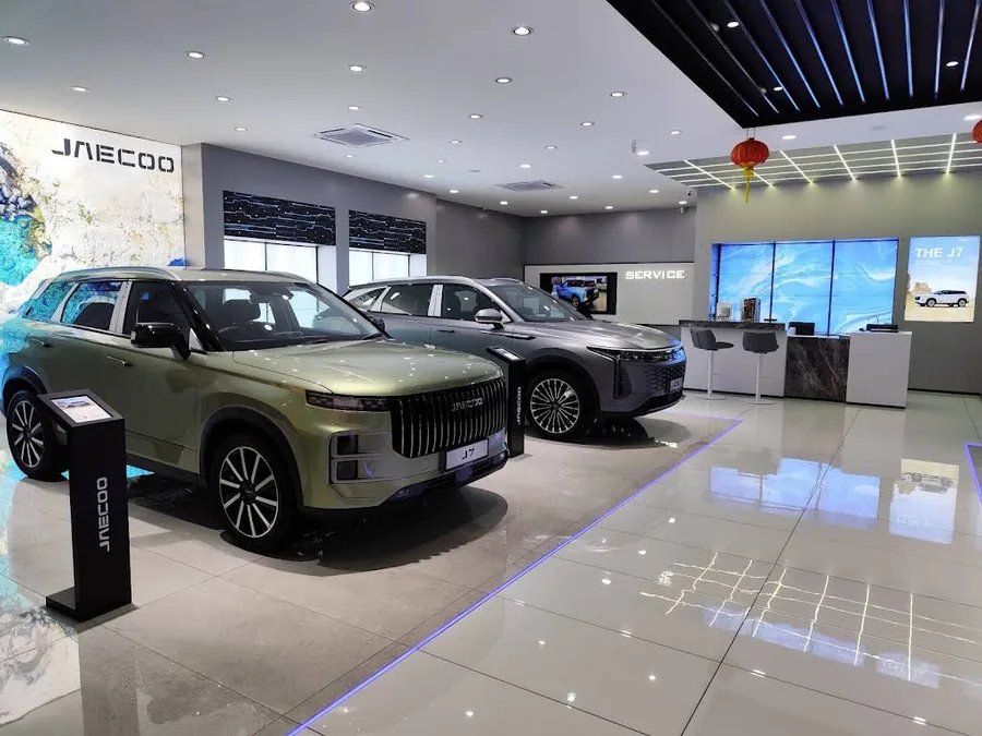 JAECOO vehicles displayed inside the Li Koon JAECOO Kluang showroom.